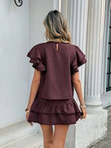 Serisse Bộ đồ 2 món dành cho nữ: Áo và chân váy ngắn cổ tròn xếp ly tay bồng màu trơn. - màu nâu - Xem 2