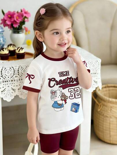 两件套女婴套装，可爱时尚的字母数字印花圆领短袖T恤搭配酒红色短裤，适合春夏日常穿着。