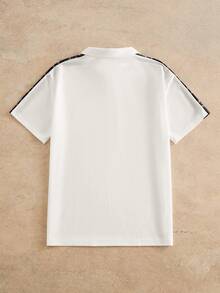 HIMLAND مجموعة قميص بولو قصير الأكمام مطبوع بنمط المربعات وشورت كاجوال مصنوعة من الأقمشة المحبوكة قطعتان - متعدد الألوان - مشاهدة 5