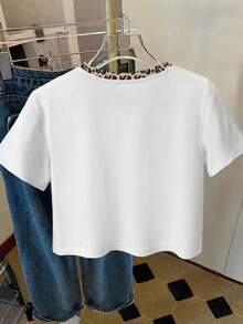 Resyla Women's Leopard Print Bow Slogan Colorblock Graphic Tee, Fashionable Cropped Round Neck Short Sleeve Top For Summer - White - View 2
