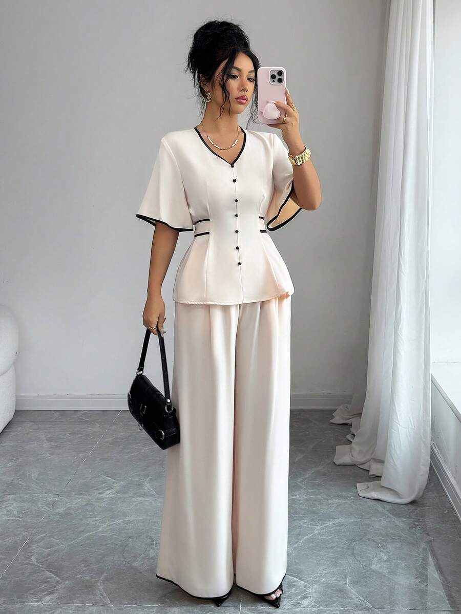Elenzga Bộ đồ nữ mùa xuân/hè mới màu mơ và đen gồm áo sơ mi cổ chữ V tay phồng thắt nơ cài nút và quần dài ống rộng cạp cao có chun, túi, đa năng, thoải mái, thanh lịch và thời trang cho trang phục hàng ngày. - Màu be - Xem 1