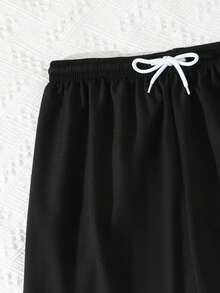 SHEIN Bộ 2 quần short đi biển cho bé trai tuổi teen, 13-16 tuổi, in hình cây cọ đen trắng, cạp chun có dây rút, dáng rộng thoải mái, thích hợp cho kỳ nghỉ hè. Quần bơi nam, quần short đi biển nam, quần bơi đen, quần bơi in hình cây cọ, quần bơi nam, quần short đi biển nam, quần bơi có dây rút, quần bơi in hình cây cọ. - Nhiều màu - Xem 6