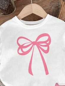 SHEIN Playful Pals 女婴蝴蝶结印花圆领短袖T恤和针织短裤两件套，可爱时尚，奶油粉色，粉色蝴蝶结印花，休闲女婴套装，适合春夏、室内外穿着，也可作为校服。 - 彩色 - 查看 5