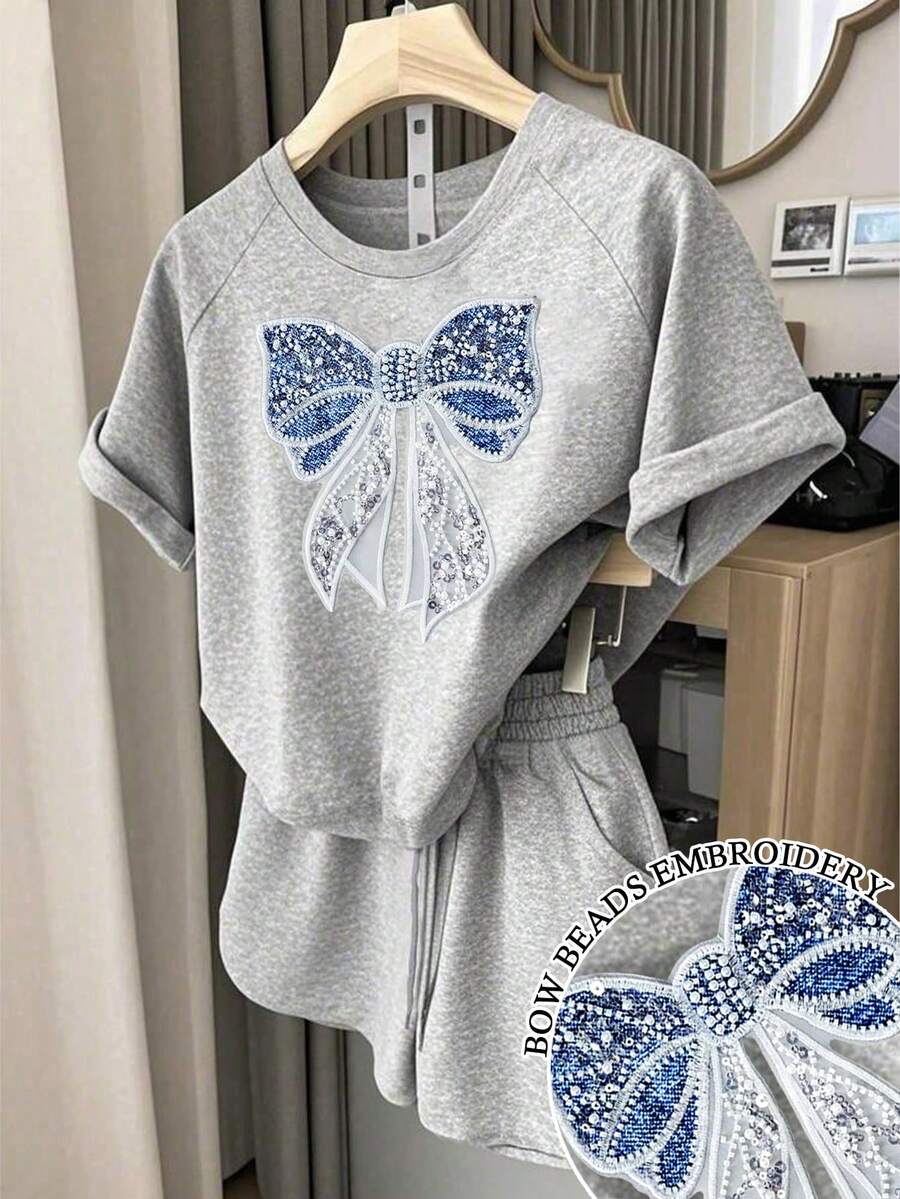 Resyla Women's Round Neck Bow Embroidery Pattern Short Sleeve Top And Drawstring Waist Pocket Shorts Casual Outfit - Light Grey - View 1
