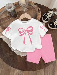 SHEIN Playful Pals 女婴蝴蝶结印花圆领短袖T恤和针织短裤两件套，可爱时尚，奶油粉色，粉色蝴蝶结印花，休闲女婴套装，适合春夏、室内外穿着，也可作为校服。 - 彩色 - 查看 8