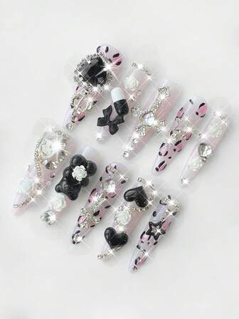 Anime 10 piezas de uñas postizas con estampado de leopardo, lazo de rosa, oso y elemento estrella en estilo lindo, hecho a mano + 3 piezas de cinta adhesiva de doble cara, forma de ojo de gato Y2K, removible y reutilizable de forma almendrada, adecuado para fiestas de temporada, bailes de graduación y uso diario.