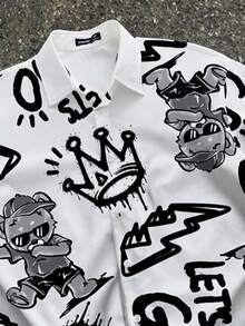 Manfinity ZONE917 Áo sơ mi tay ngắn dáng rộng, màu đen, in hình vương miện và tia sét theo phong cách graffiti, kiểu dáng oversized, rất phù hợp cho các buổi hẹn hò và tụ họp, món quà tuyệt vời dành cho bạn trai. - Nhiều màu - Xem 2