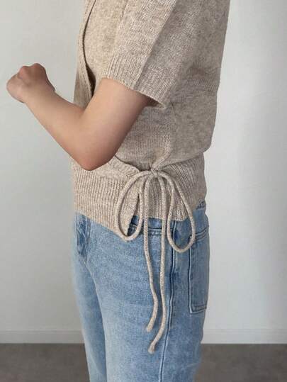 FRIFUL Women's Solid Color Asymmetric Neckline Hollow Hem Side Tie Waist Fitted Casual Versatile Knit Top