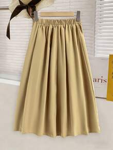 SHEIN 浅米色女童中长裙，正面饰有两个同色蝴蝶结，侧边开衩设计，风格温柔优雅，适合通勤、春秋季穿着。 - 卡其色 - 查看 5