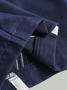 Casuvi Kids Loose Fit Navy Blue Casual Sports Pants For Tween Boywith Two White Stripes On Sides, "CALIFORNIA" Text, And Oval "CAx" Logo Graphic, Suitable For School, Sports, And Casual Weekends Kids Sports Wear - Navy Blue - View 7