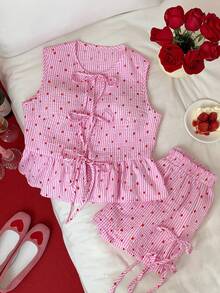 Comfortcana Bộ đồ nữ thời trang mới năm 2026 gồm áo hai dây và quần short cotton kẻ sọc in hình trái tim, kiểu dáng thường ngày, buộc dây phía trước, thích hợp mặc nhà vào mùa hè, xuân, ngày lễ tình nhân, màu hồng. Bộ hai mảnh màu hồng, quần short màu hồng, bộ đồ ngủ màu hồng, quần short in hình trái tim, áo và quần short kẻ sọc, bộ đồ mặc nhà dễ thương, áo kiểu màu hồng, thanh lịch, thích hợp cho kỳ nghỉ, thường ngày, phong cách Y2K, quần áo mùa hè, xuân, ngày lễ tình nhân, trang phục lễ hội, bãi biển, tiệc sinh nhật, đám cưới, trang phục đi chơi cho nữ, áo không tay và quần short, bộ quần short in hình trái tim, bộ in hình trái tim, bộ quần short kẻ sọc, bộ quần short nữ. - Đỏ - Xem 6