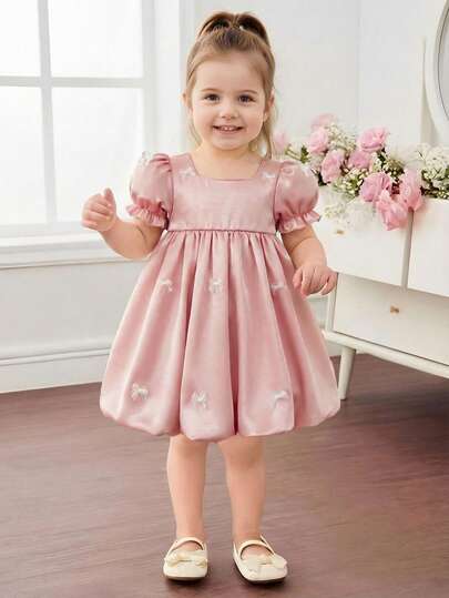 Elladie kids 1件女婴夏季新款方领松紧腰泡泡短袖缎面灯笼裙，带蝴蝶结装饰，简约百搭时尚可爱公主裙，适合幼儿