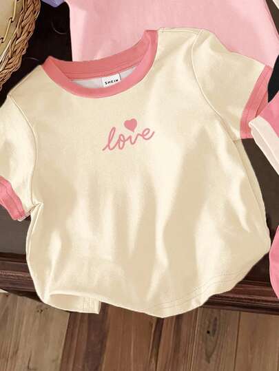 SHEIN تي شيرت قصير الأكمام أساسي بياقة دائرية، مناسب للربيع/الصيف، تصميم أنيق وبسيط للفتيات الصغيرات