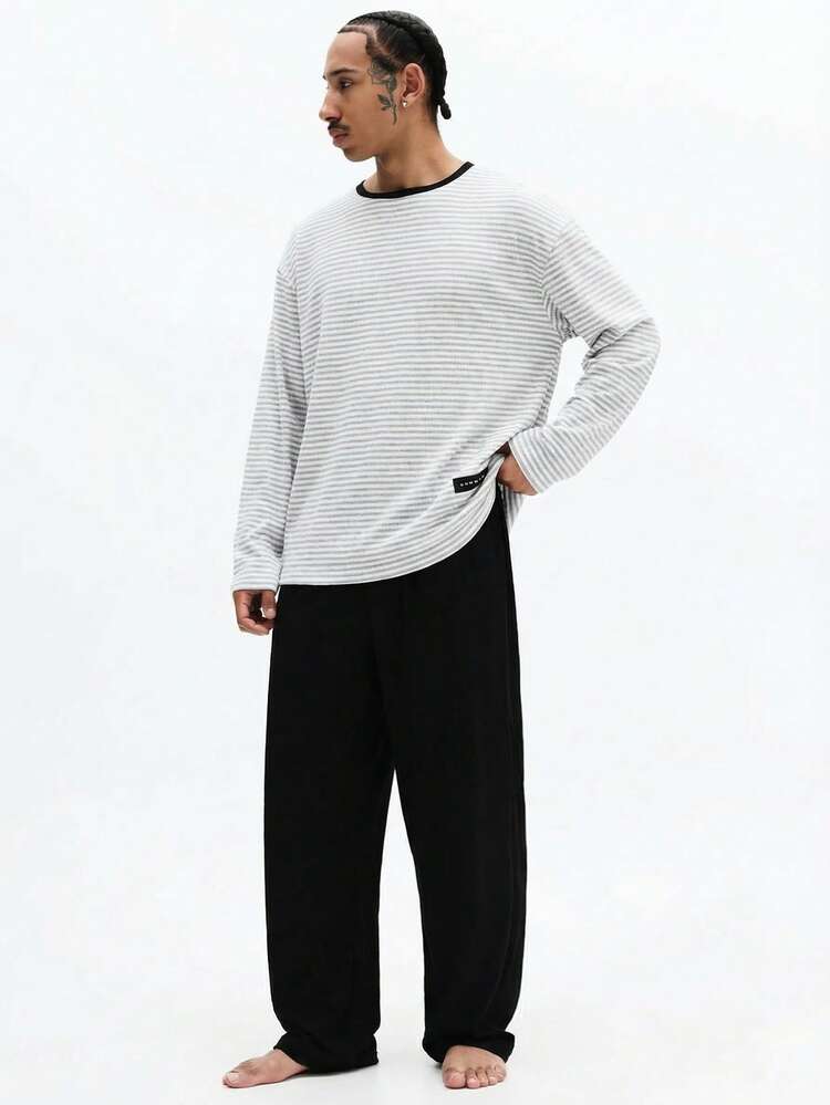 Set aus gestreiftem Langarmshirt und Loungehose