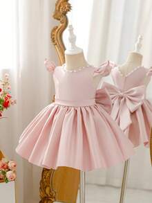 Glamorique Kids 这款女童粉色缎面连衣裙，光泽亮丽，后背饰有大蝴蝶结，并点缀着手工串珠。适合夏季度假、公主主题活动、毕业舞会、演出、宴会和派对等场合。这款春季连衣裙也完美适用于宝宝生日、婚礼花童和其他特殊场合。 - 粉色 - 查看 8