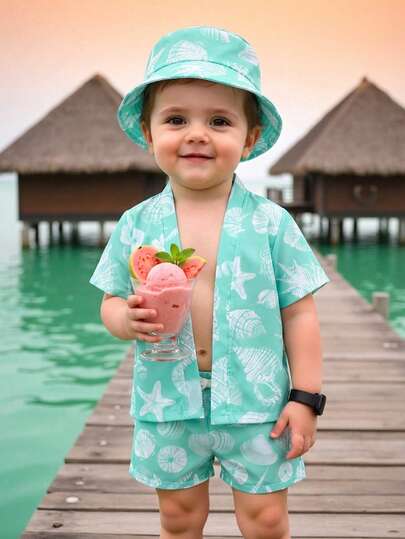 SHEIN 男婴休闲度假可爱贝壳图案短袖衬衫、泳裤和遮阳帽三件套，适合海滩、冲浪、度假、游泳和防晒。