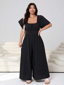 Solflare Bộ áo liền quần tay ngắn bồng bềnh đa năng, màu đen, cỡ lớn, phù hợp cho mùa Xuân/Hè 2026, thích hợp mặc hàng ngày, dự tiệc, hẹn hò, sinh nhật, lễ hội âm nhạc, đi học, đi làm, đi nghỉ mát. Kiểu dáng trễ vai, chất liệu cotton pha mềm mại, dáng rộng, dài. - màu đen - Xem 5