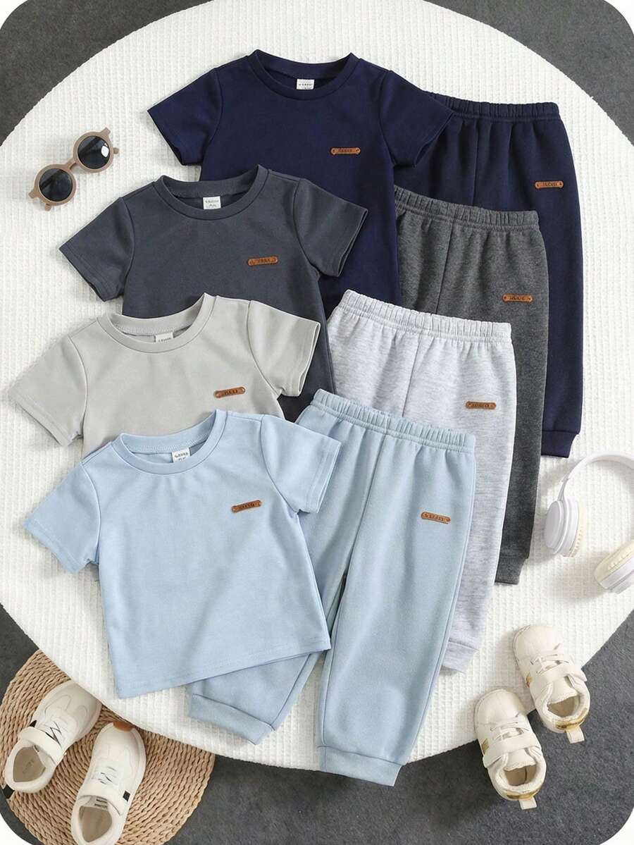 SHEIN 4pcs/Set Unisex Baby Basic Solid Color Crew Neck Short Sleeve T-Shirt Knit Tops Set, Comfortable Casual Versatile Suitable For Spring/Summer Indoor Daily And Outdoor Activities