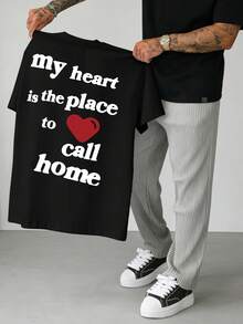 Manfinity LEGND Áo thun nam màu đen dáng rộng, phong cách thường ngày, thời trang đường phố, in khẩu hiệu và hình trái tim, thích hợp cho mùa hè. - màu đen - Xem 6