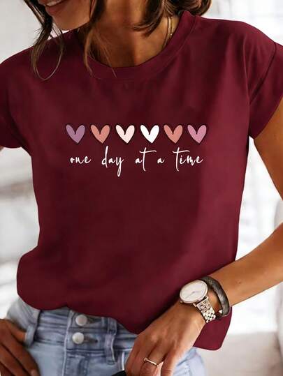 EMERY ROSE Women's Light Blue Casual Short-Sleeve T-Shirt With "One Day At A Time" Heart Print - Soft Polyester, Round Neck, Machine Washable, Spring/Summer Fashion Essential, Everyday Tshirt | Round Neck Shirt | Polyester Fabric Burgundy Tops Cute T Shirts Women Maroon Tops Tshirts For Women Graphic Cute Graphic Tees For Women