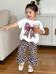 SHEIN Playful Pals Girls Knitted Fabric Short Sleeve Tee And Full Print Leopard Bell Bottom Pants Set With Cute Bow Design - White - View 9