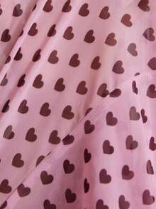 Revavyn 粉紫色长袖连衣裙，黑色爱心印花，V领系带设计，复古浪漫风格，适合春秋季约会和休闲场合，松紧腰身，宽松裙摆，轻盈雪纺面料，飘逸灵动。关键词：爱心印花连衣裙，系带V领，雪纺长裙，复古波点，收腰设计，浪漫风格，约会连衣裙，情人节，春秋季连衣裙 - 彩色 - 查看 7