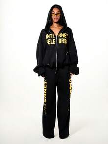 SUMWON WOMEN Bộ đồ thể thao nữ màu đen dáng rộng có khóa kéo, in chữ nổi tiếng màu vàng, quần ống rộng kiểu dáng thường ngày, gồm hai mảnh. - màu đen - Xem 3