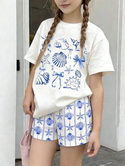 SHEIN 春夏少女休闲时尚创意个性清新优雅简约海星贝壳海螺蝴蝶结波浪线图案印花休闲基础款短袖T恤和短裤套装，舒适日常穿着，温暖夏日风格，适合春夏少女。