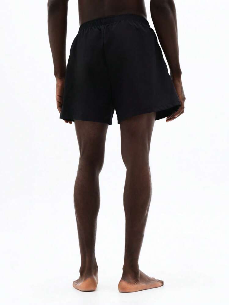 Calções de banho de praia de pernas largas