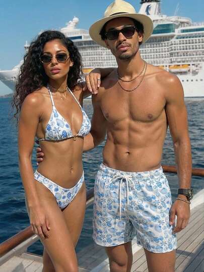 Manfinity Swimmode شورت شاطئ فضفاض بخصر رباط وجيوب مائلة، بطبعة كائنات بحرية على الجميع، لأسلوب الإجازات الصيفية الكاجوال للرجال