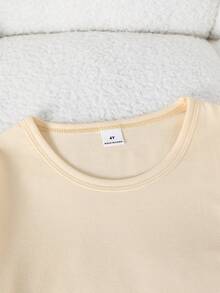 SHEIN Genkimix Kids 女童圆领长袖T恤，杏色主色调，饰有多个蝴蝶结，甜美俏皮，适合春夏日常穿着、上学、休闲外出、家庭聚会等场合，展现柔软可爱的公主风，可搭配任何裤子。 - 杏色 - 查看 4