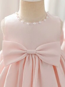 SHEIN Glamorique Kids Abito da damigella d'onore per bambina con tessuto morbido e lucido rosa, fiocco grande, strascico con ricamo a mano con perline. Adatto come abito per il primo compleanno della bambina e perfetto per la primavera e l'estate. Ideale per balli di laurea, eventi serali formali e outfit da festa. Abito rosa con fiocco per bambina, abiti eleganti per bambina con fiocco grande, abito rosa per bambina - Rosa - Visualizzare 5