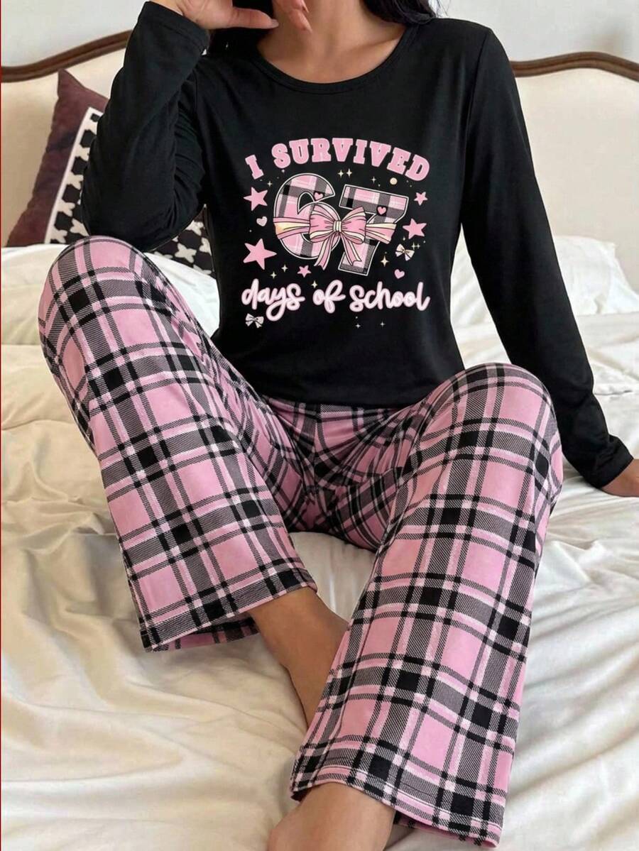 SHEIN Genkimix Kids مجموعة بيجاما مكونة من قطعتين للفتيات المراهقات، ملابس علوية طويلة الأكمام من الحرير الحليبي مع طباعة فراشة وفيونكة، وبنطلون فضفاض مربع، ملابس نوم مريحة مناسبة للارتداء اليومي، طقم بيجاما مربع - الأسود - مشاهدة 1