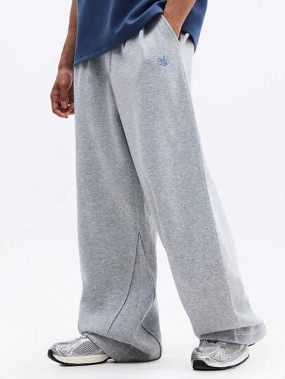 SUMWON Pantalones de chándal holgados con pliegues en tela jaspeada, con cintura limpia y bolsillos laterales para comodidad casual y ropa de estar en casa
