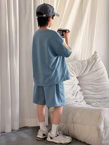 两件套儿童/青少年男童休闲舒适大字母印花圆领宽松短袖蓝色T恤和短裤运动套装，适合春夏季节、郊游、情人节、约会、旅行、度假、家庭聚会、返校、婚礼、晚宴、运动、生日派对等场合。 - 藍色 - 查看 2