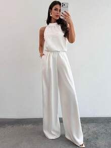 Firerie Quần ống rộng ôm dáng màu trắng không tay cổ tàu đính ngọc trai dành cho nữ, bộ jumpsuit trắng đính hạt lãng mạn, jumpsuit không tay, thời trang công sở, lễ tốt nghiệp, trang phục giáo viên, xuân/hè/thu, thanh lịch, đi làm, hẹn hò, tiệc tùng, lễ hội âm nhạc, mùa cưới, tốt nghiệp, dạ hội, biểu diễn, hòa nhạc, trang phục công sở, tựu trường, tiệc thường niên, sinh nhật nữ, trang phục ngày lễ - trắng - Xem 7