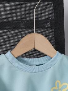 Genkimix Kids 女童宽松圆领短袖上衣，浅蓝色底黄色碎花图案，舒适可爱，适合夏季日常玩耍、花园漫步、家庭野餐等场合，甜美碎花蓝色短袖T恤 - 藍色 - 查看 4