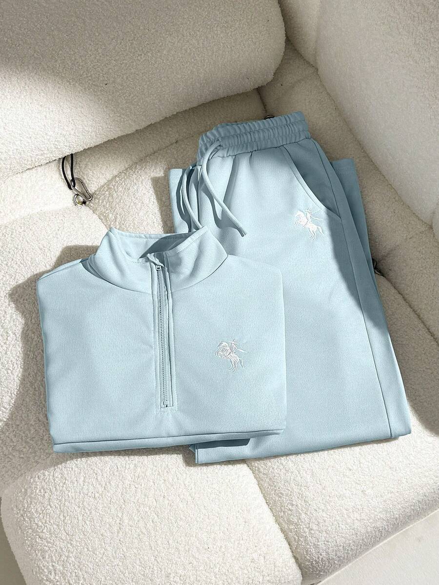 SHEIN 两件套女童休闲套装,包括一件宽松版型的长袖拉链高领卫衣和一条宽松阔腿裤,适合日常穿着和运动。 - 淺藍色 - 查看 1