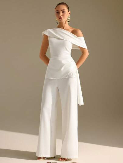 CLARA VERO White Asymmetric Ruffle Top And Wide Leg Pants Set: Slim Fit Waist And Flowing Maxi Length, Perfect For Elegant Evenings Or Modern Engagement Parties, Made In Non-Elastic Double Layer Polyester Featuring Folded Shoulder Draping Side Lace Detail And Concealed Zip