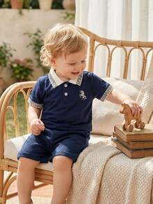 Souflis Souflis 2pcs/Set Toddler Boys Polo Collar Short Sleeve Top And Shorts Outfit, Top With Ribbed Collar And Cuffs, Embroidered Design, Textured Fabric Shorts, Perfect Summer Outfit For Baby Boys Baby Boy Casual Short Sleeve Toddler Boy Short Set Baby Boy Clothes Navy Baby Outfit Baby Boy Polo - Navy - View 1