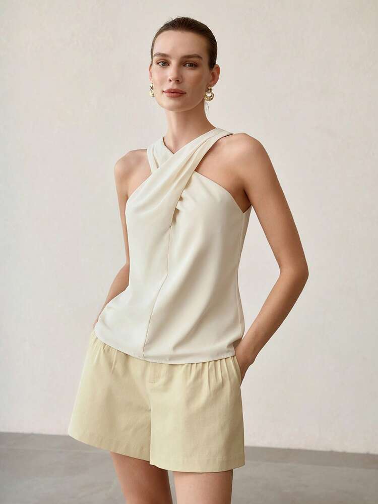 WOMEN'S APRICOT SLEEVELESS CRISS-CROSS HALTER NECK ELEGANT TOP