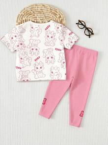 SHEIN 奶油白和奶油粉，可爱猫咪动物印花，少女休闲简约柔软舒适宽松圆领短袖T恤和打底裤套装，适合日常穿着、外出、居家、度假、返校、春夏女孩穿搭，轻松舒适，适合小女孩的春夏套装，时尚女孩，休闲装，婴幼儿猫咪动物图案服装，春夏时尚，别致，新潮，休闲