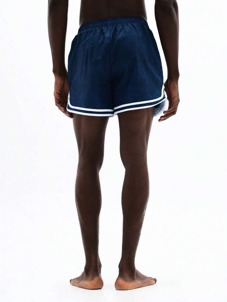 Calções de banho em nylon com detalhes contrastantes.