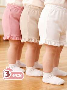 SHEIN Vintaside Kids 3件套婴幼儿女童休闲宽松舒适短裤套装，柔软透气镂空针织面料，弹性腰带配荷叶边，粉色和白色纯色，多种颜色可选，性价比高，适合春夏居家/外出/度假穿着。 - 米色 - 查看 1