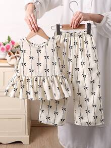 SHEIN LMoss Kids 女童蝴蝶结印花碎花无袖上衣和宽松休闲裤套装两件套 女童碎花套装 女童两件套碎花套装 女童半身裙套装 碎花半身裙套装 女童碎花半身裙套装 蝴蝶结上衣套装 女童套装 女童服装套装 女童半身裙套装 碎花半身裙套装两件套 幼儿 - 杏色 - 查看 6