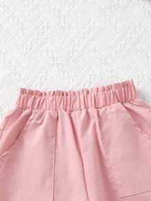 SHEIN Genkimix Kids Quần ống rộng dáng suông cho bé gái, màu hồng nhạt, thiết kế tối giản và nhẹ nhàng, cạp chun co giãn + túi tiện dụng, kiểu dáng mềm mại phù hợp cho hoạt động thể thao. Thích hợp cho các dịp xuân/thu như đi học, đi chơi, họp mặt gia đình, phong cách Hàn Quốc nhẹ nhàng. - Hồng - Xem 5