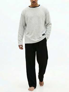 SUMWON طقم بيجامة مريح مكون من ملابس علوية بياقة طاقم وأكمام طويلة مخطط وبنطال مستقيم الساق، مع تشطيب متباين