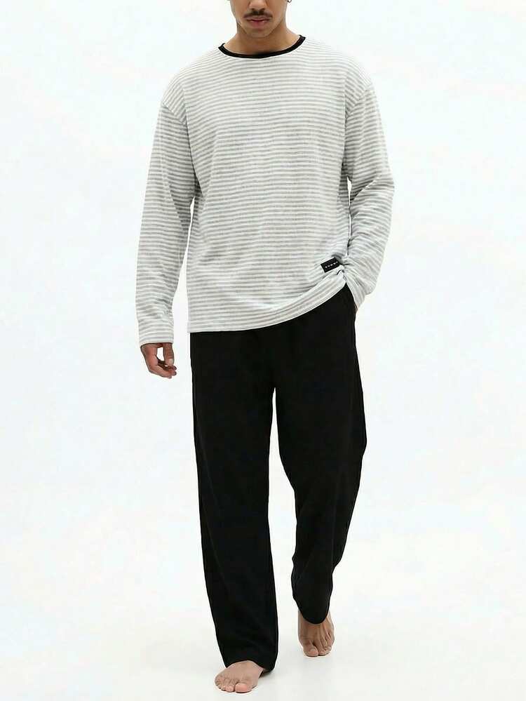 Set aus gestreiftem Langarmshirt und Loungehose