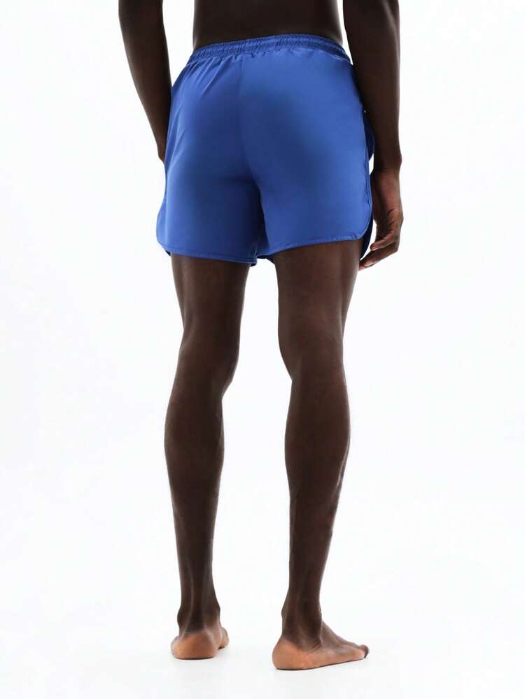 Short de plage à ourlet incurvé