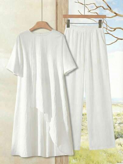 Rusticease Damset med enfärgad asymmetrisk fåll, rund hals, kortärmad topp och byxor, 2-delat set